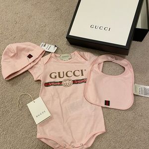 Gucci baby girl onesie, hat and bib